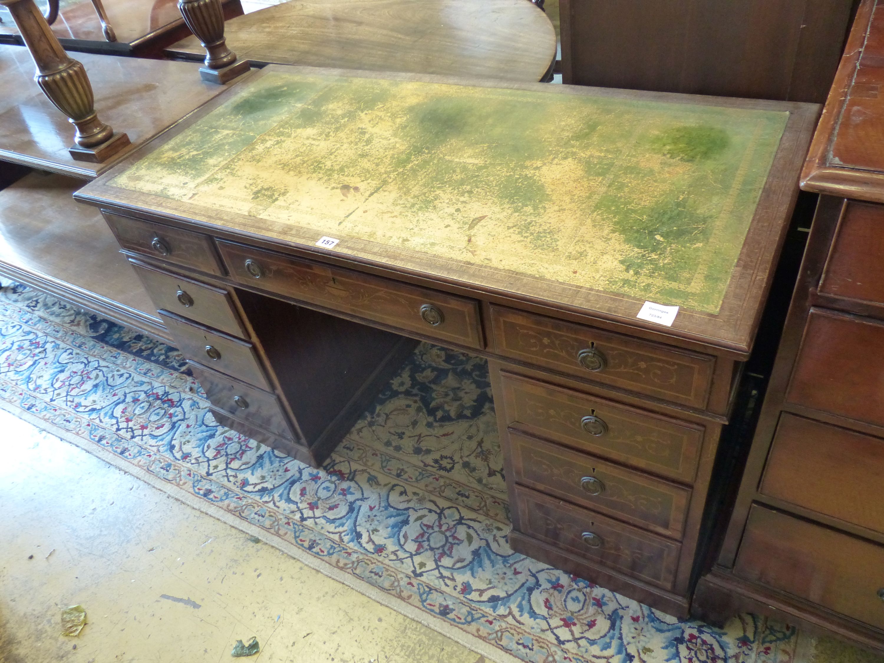 An Edwardian satinwood banded marquetry inlaid mahogany pedestal desk, width 121cm, depth 60cm, height 73cm